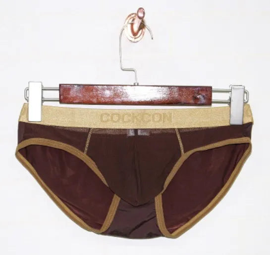 1 pçs marca cockcon net roupa interior masculina grenadine briefs gay roupa interior sexy modelo sólido roupa interior cinto de ouro